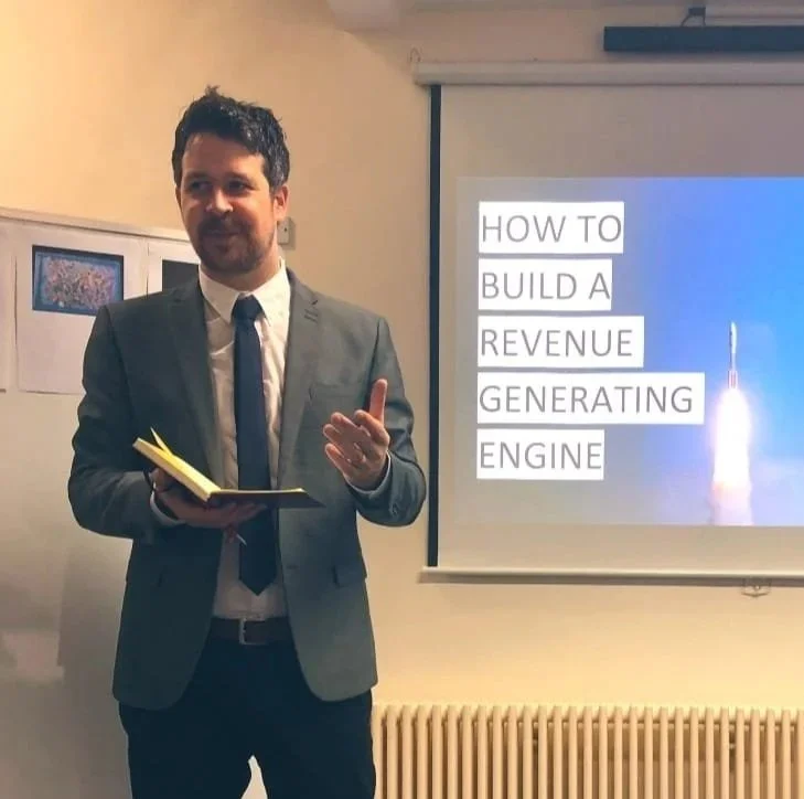 Predara founder presenting on building a revenue-generating engine