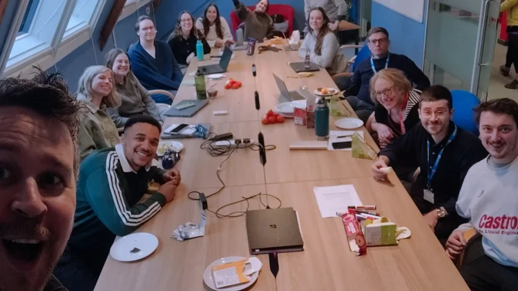 Predara team working together at an in-person session